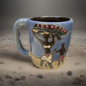 Mara Stoneware Coffee Mug Woman Carrying Basket Coffee Beans Blue Folk Art